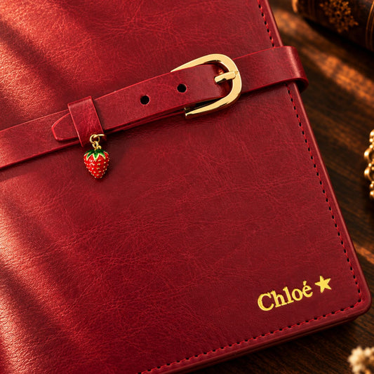 Burgundy The Mémoire Journal by Inwords Gifting, a hardcover journal with lined pages for personal writing and note-taking.