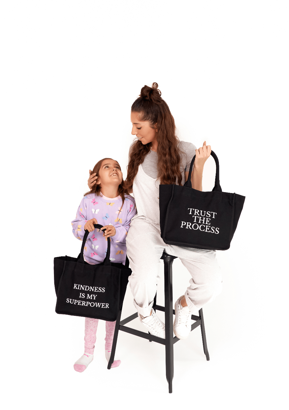 Black everyday tote bag from Inwords Gifting with an inspiring quote, suitable for daily use and casual outings.