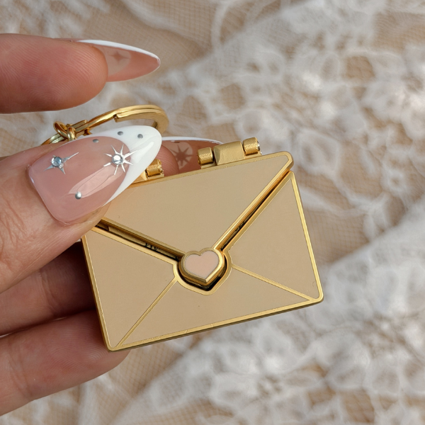 Silver Forever Letter Keyring from Inwords Gifting featuring a personalized engraved letter charm with a keyring attachment.