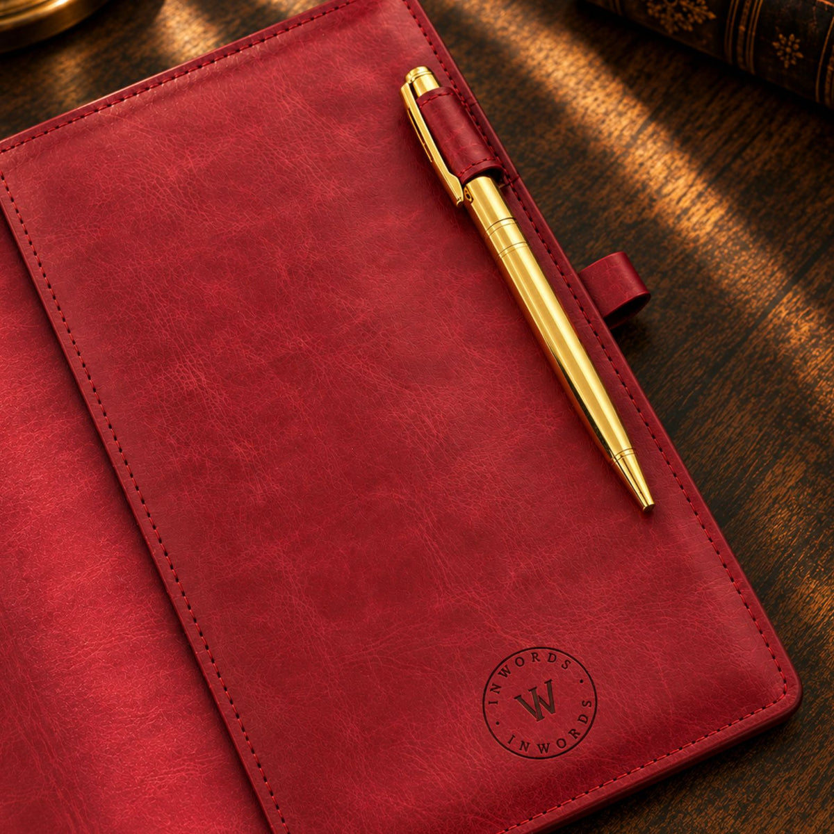 Burgundy Inwords Gifting Mémoire Journal with soft cover and lined pages for writing and reflection.