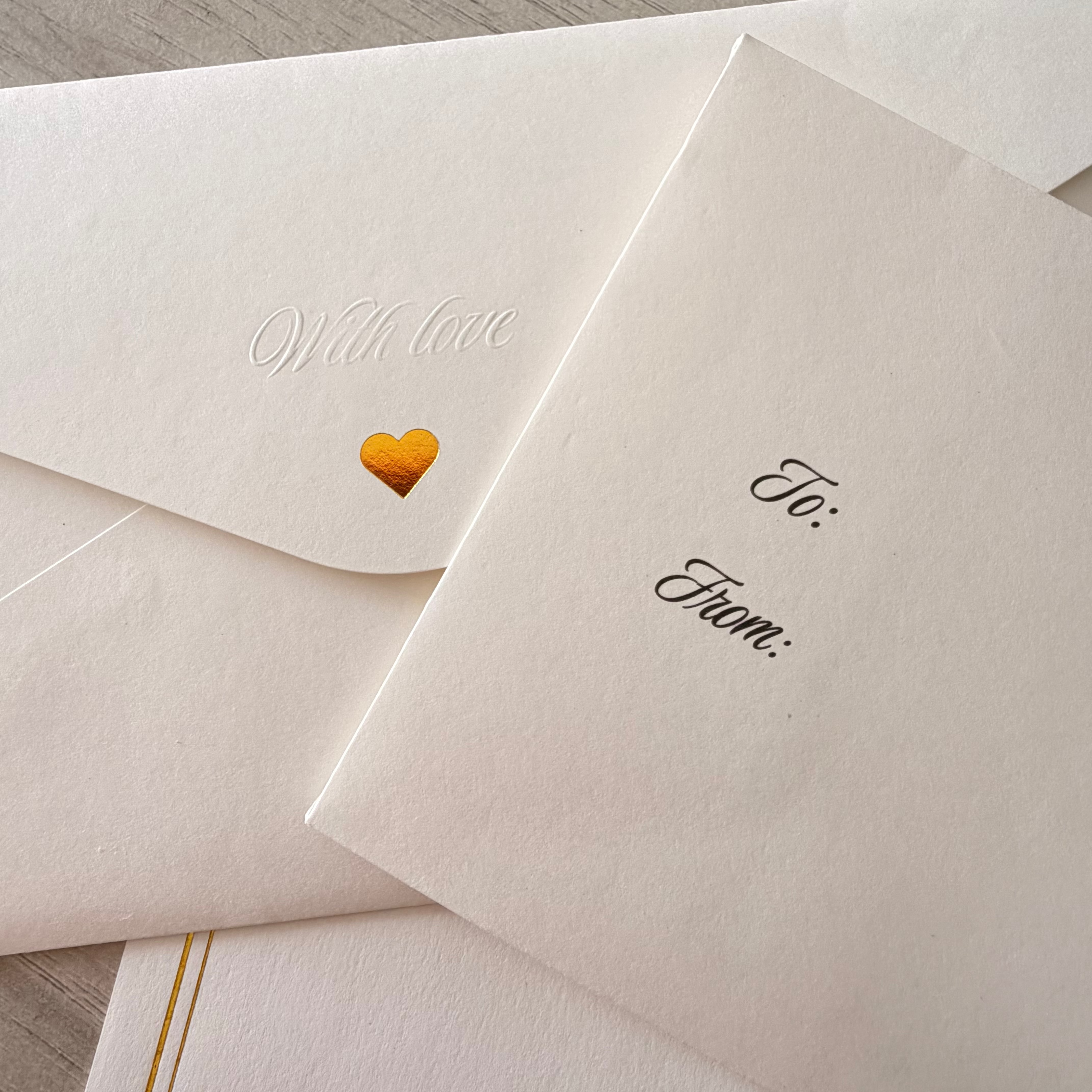 Anniversary letters — gold-foiled envelopes with To and From