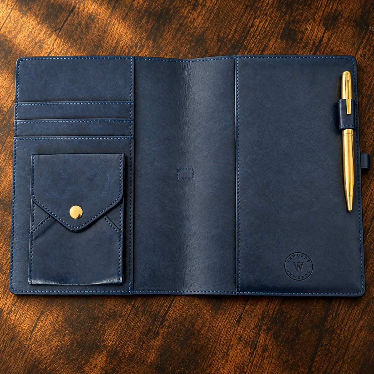 Navy blue Inwords Gifting Mémoire Journal with hardcover and lined pages, designed for personal reflection and note-taking.
