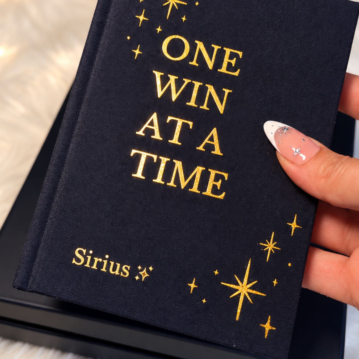 Christmas Edition gift set by Inwords Gifting featuring motivational "One Win at a Time" message on festive packaging.