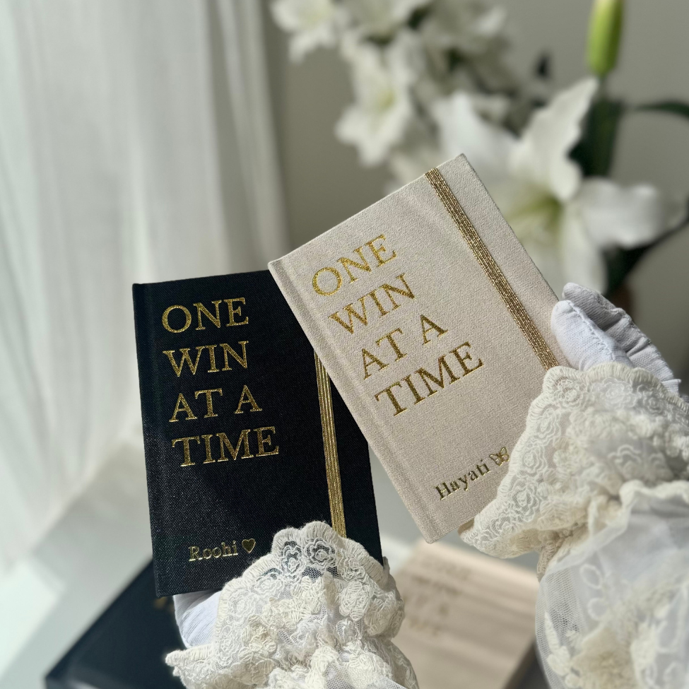Black and beige The One Win At a Time Duo gift set by Inwords Gifting, featuring two stylish, motivational items.