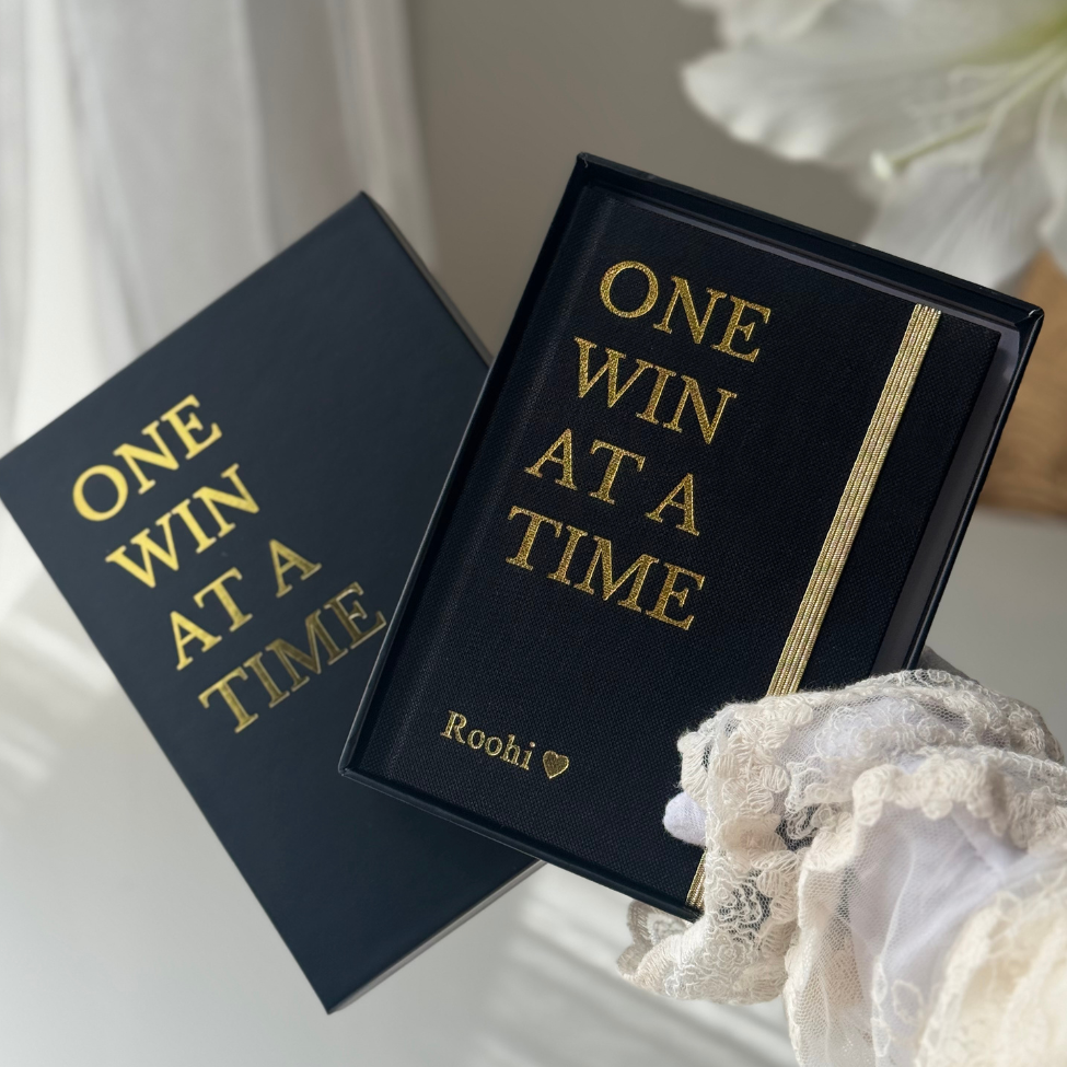Inwords Gifting One Win at a Time Notebook featuring a stylish cover, perfect for journaling and goal setting.