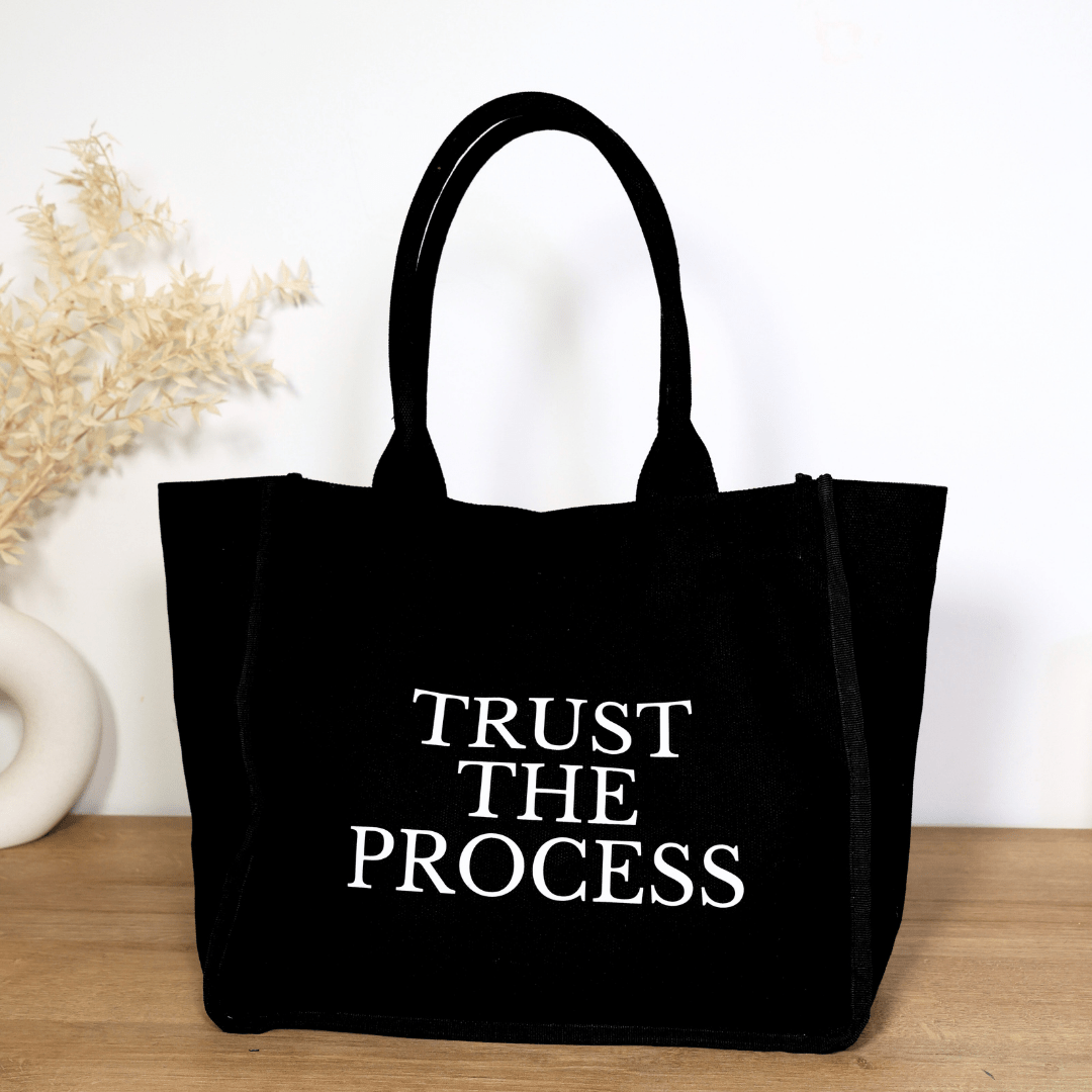 Black everyday tote bag by Inwords Gifting with an inspiring quote, perfect for daily use and casual outings.