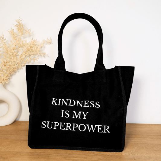 Black everyday tote bag by Inwords Gifting with an inspiring quote, made for daily use and stylish carrying.